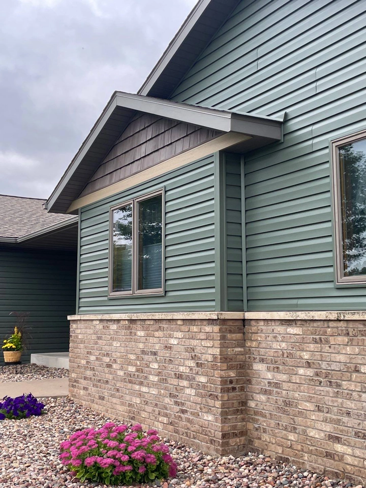 green new siding on house