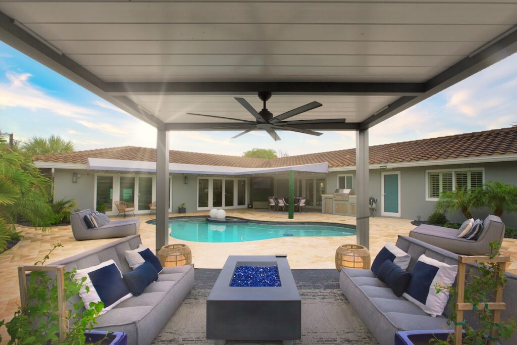 pool with white r blade pergola