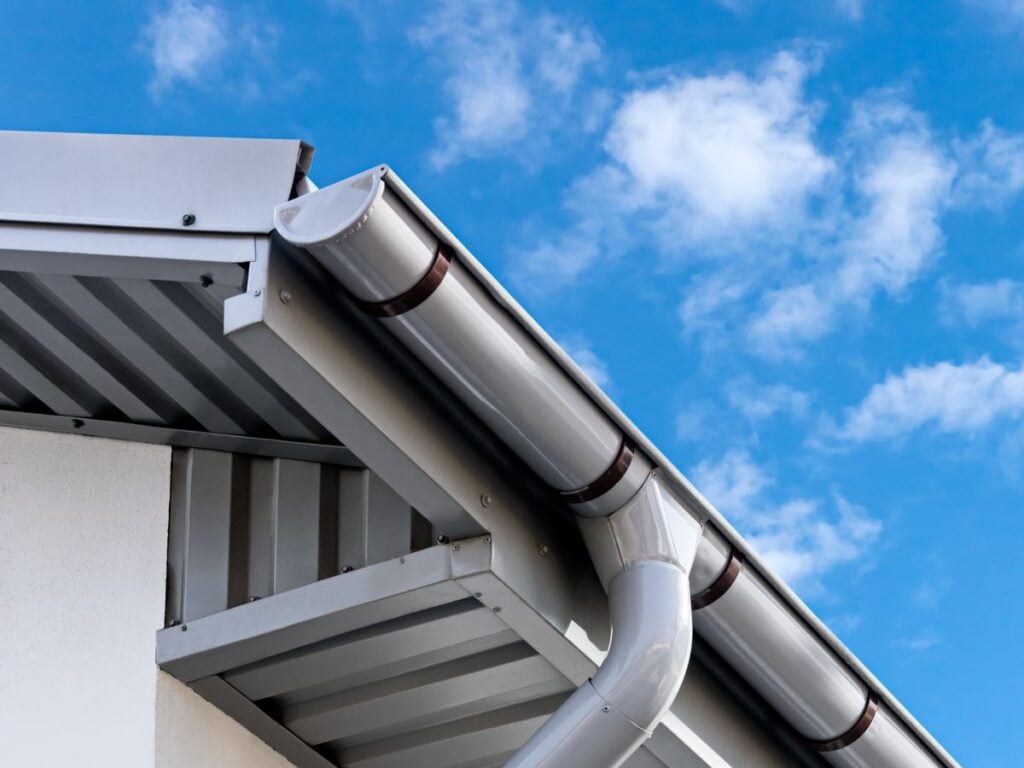 closeup of white half round gutters