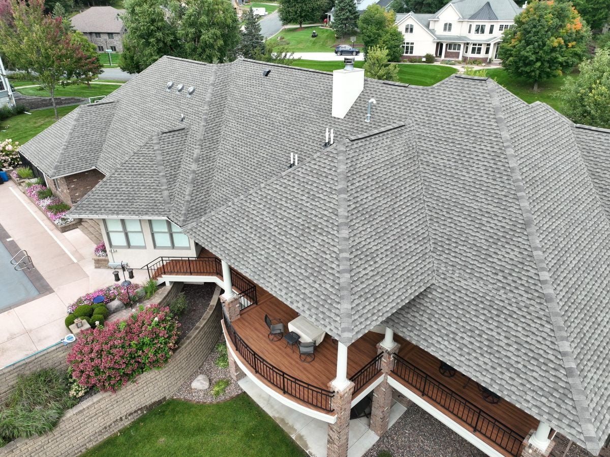 big house with asphalt shingle roof