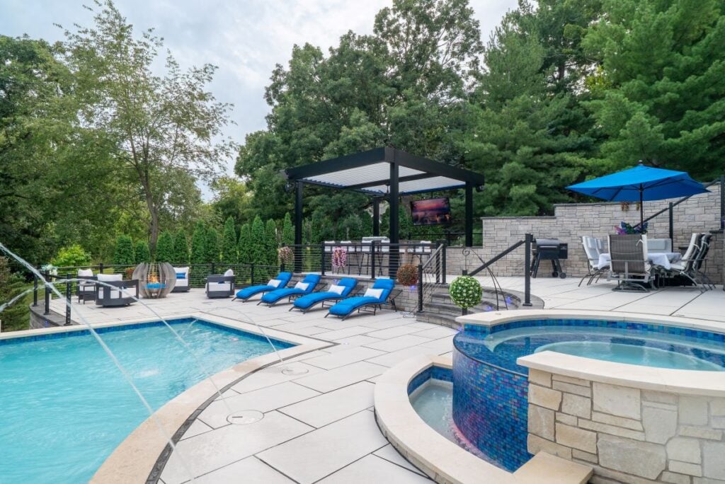 black pergola next to a pool