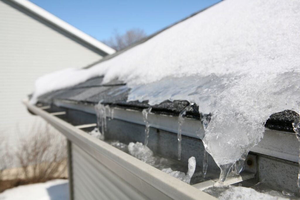 ice and snow on roof and gutters