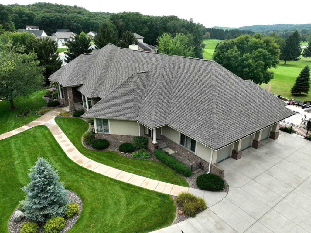 Large house with grey asphalt shingle