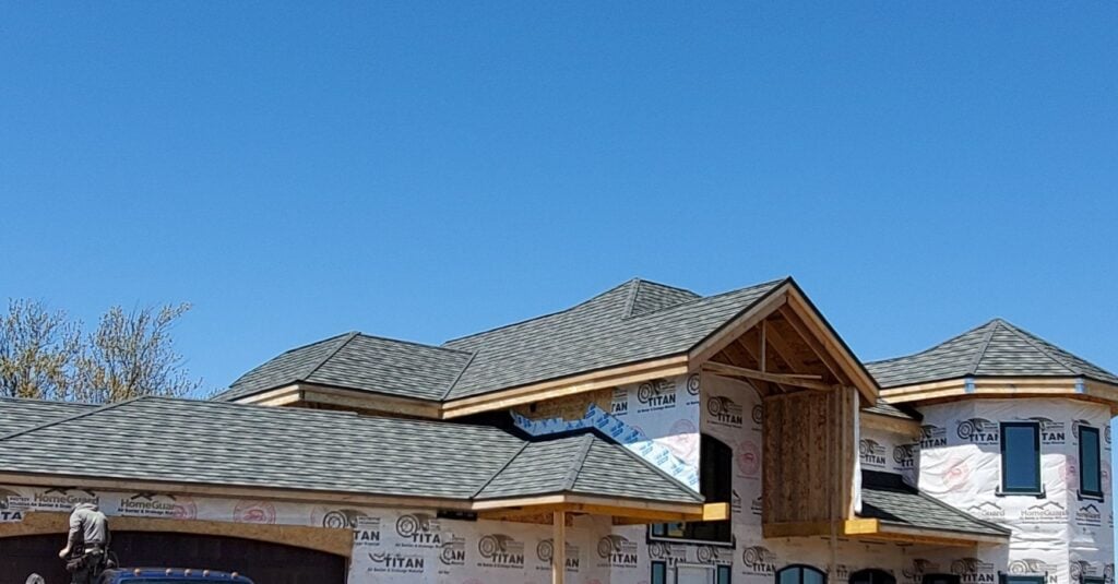 New shingle roof being installed