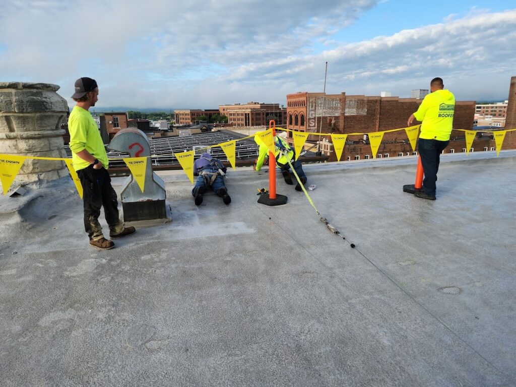 First American workers on roof