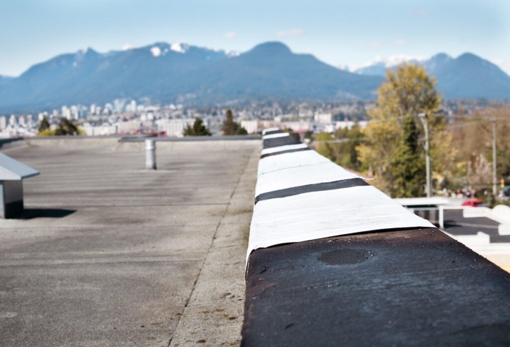 Border sealed commercial roof