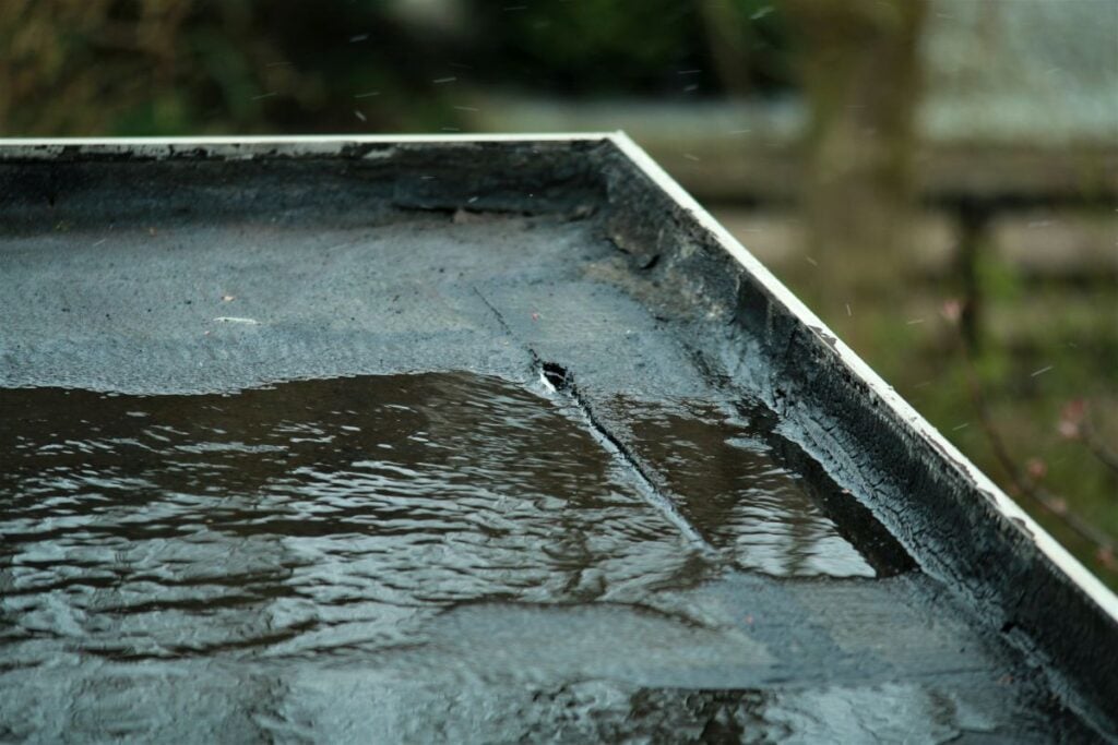 what causes roof leaks in chippewa falls wi homes small hole on top of flat roof